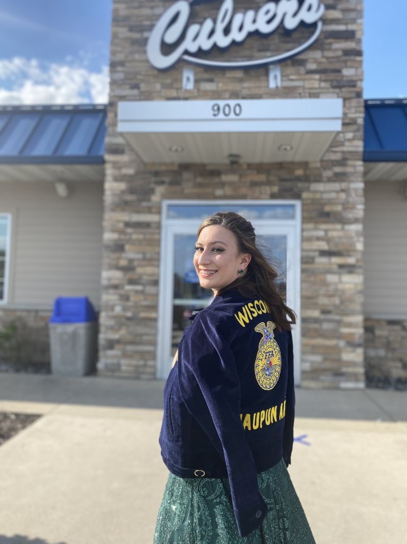 Waupun FFA member and officer Samantha stands in from of a Culver's